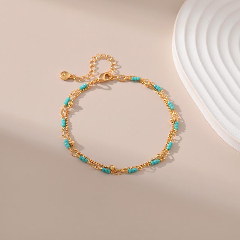 Gold Plated Double Layer Turquoise Color Seed Bead Bracelet With Extension Chain золотой