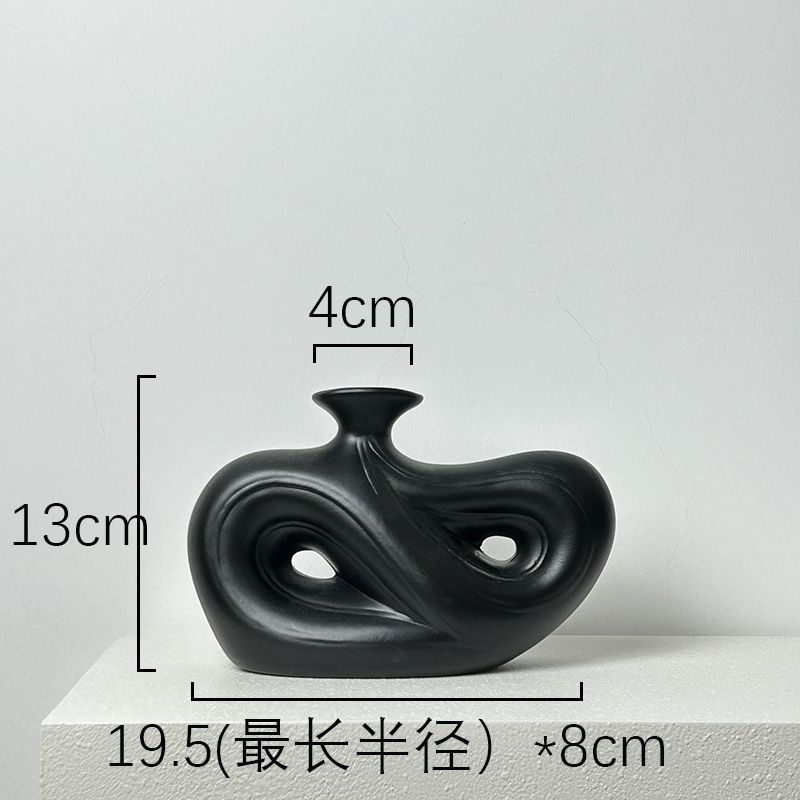 

Vintage Black Special-shaped Ceramic Flower Vase Simple Hollow Hydroponic Vase Flower Arrangement Container Entrance Decoration