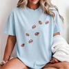 Pastel Light Blue Watercolor Ladybug Print T-Shirt, Scattered Lucky Lady Beetle Minimal Cottagecore Relaxed Fit Crew Neck Casual Tee