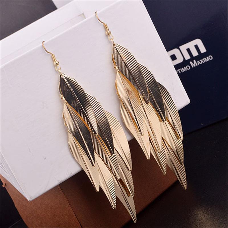 Fashion exaggerated niche temperament fringed earrings retro personality versatile sequined earrings women's long ear jewelry