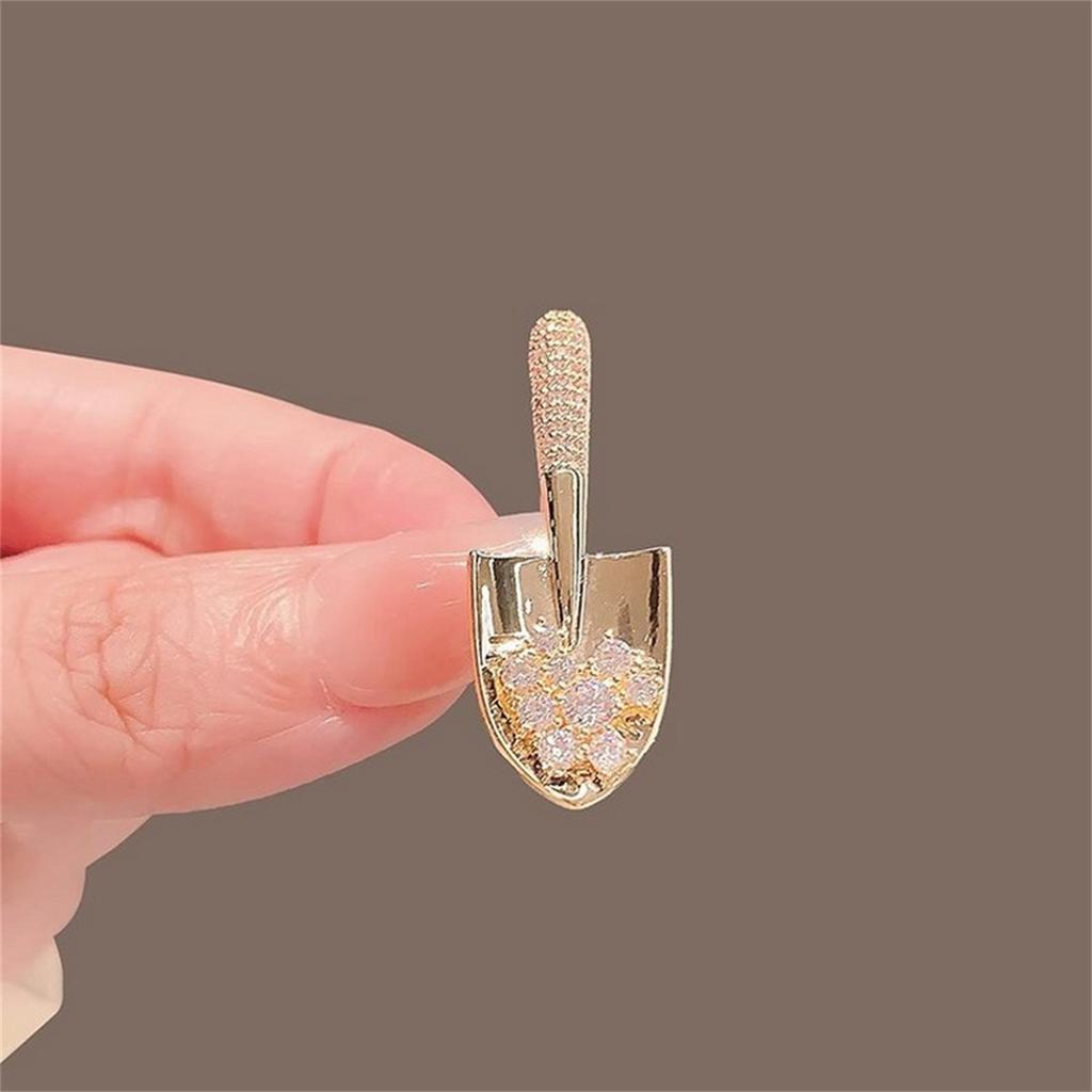 Rinhoo Cute Small Shovel Shaped Brooches For Women Creative Gold Color Rhinestone Shovel Lapel Pins Metal Button Badge Jewelry