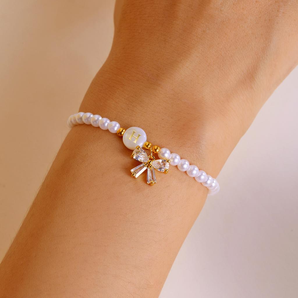 Imitation Pearl 26-Letter Initial Bracelet For Women, Light Luxury Zircon Bow Pendant Bracelet, Girl'S Wrist Jewelry Gift.