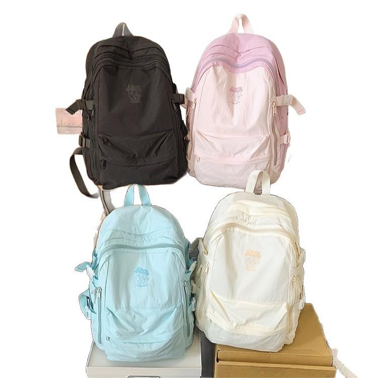 Schooltas Effen Kleur Eenvoudig Outdoor Stijl Rugzak Vrouwelijk Design Gevoel Niche Lichtgewicht Schooltas Kleine Rugzak voor Basisschool en Middelbare School