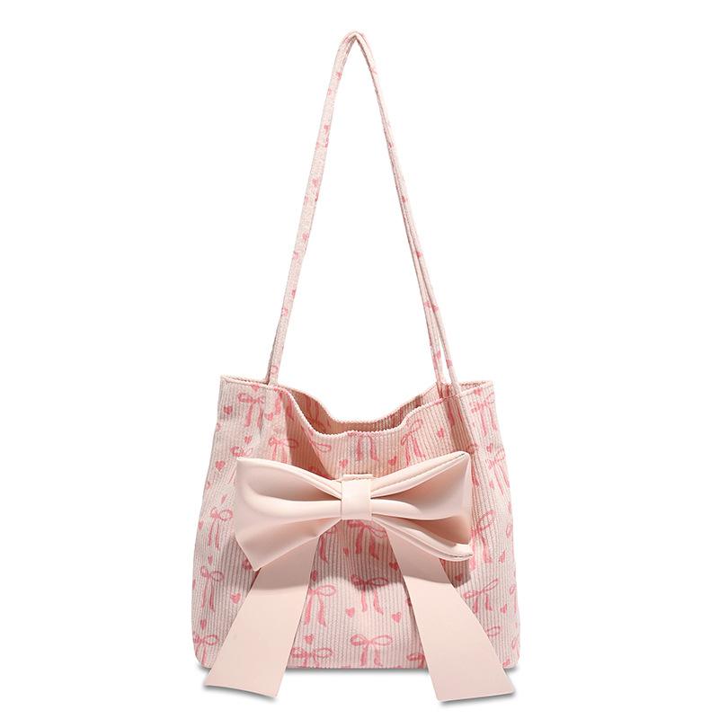 

Korean new sweet and fashionable large-capacity bow canvas bag tote bag going out to commute to class shoulder bag women рожевий