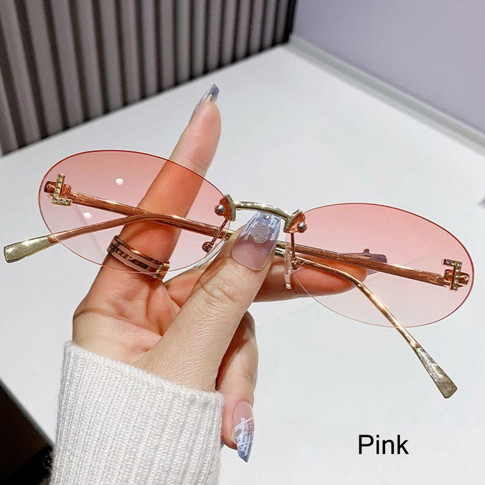 Modische ovale Sonnenbrille für Damen, Luxusqualität, Buchstabendekor, Sonnenbrille, trendige randlose Katzenaugen-Brille, UV400-Schutz, Metall