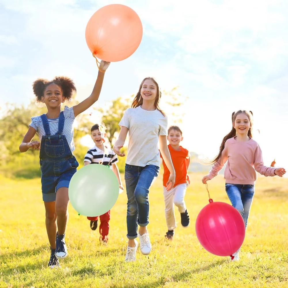 50 Stück Neue Bunte Punch-Ballons mit Gummiband-Griff Lustiges Outdoor-Spielzeug Hüpfbälle Partydekoration