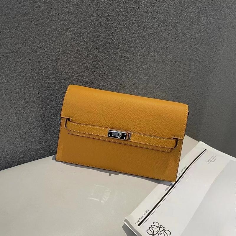 New lychee pattern leather half cover hand grab bag genuine leather women's bag single shoulder underarm bag oblique span bag wholesale