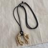 Women's Metallic Leopard Pendant Necklace Adjustable Long Black Wax Rope Sweater Chain Unique Design