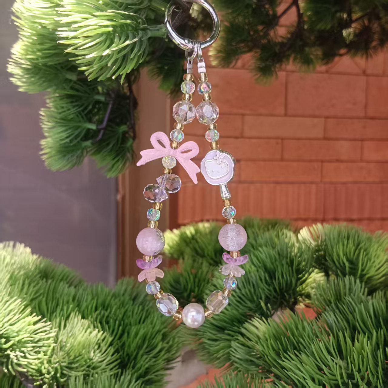 

KT Cat Crystal Beaded Phone & Handbag Charm – Cute, Colorful, Purple & Pink Bow Design