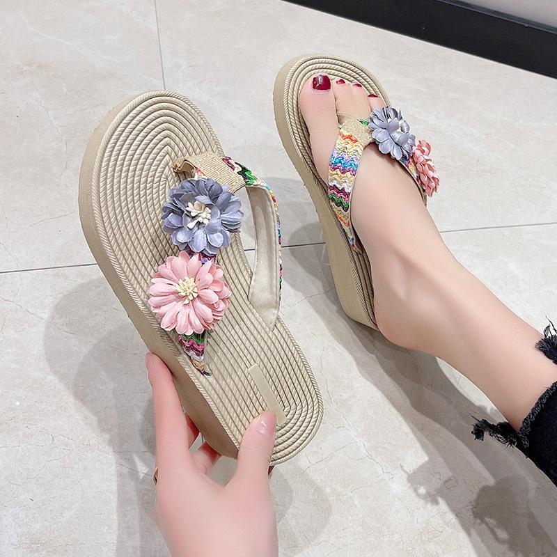 Ins Internet celebrity summer imitation straw hemp sole flower flip-flops women's fashion trend pinch foot thick sole beach shoes