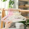 Pearl Hanger: Chic Clothing Display for Fashionable Stores