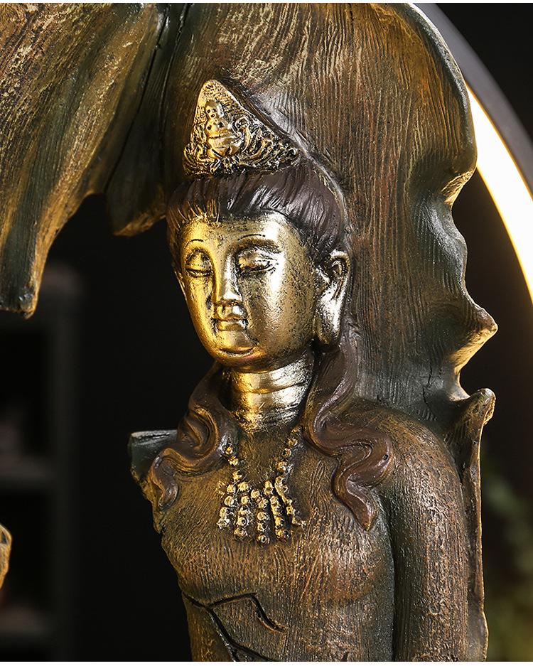Zen Guanyin Buddha Statue with Golden Cicada Lamp and Flowing Water Fish Tank for Home Entrances.