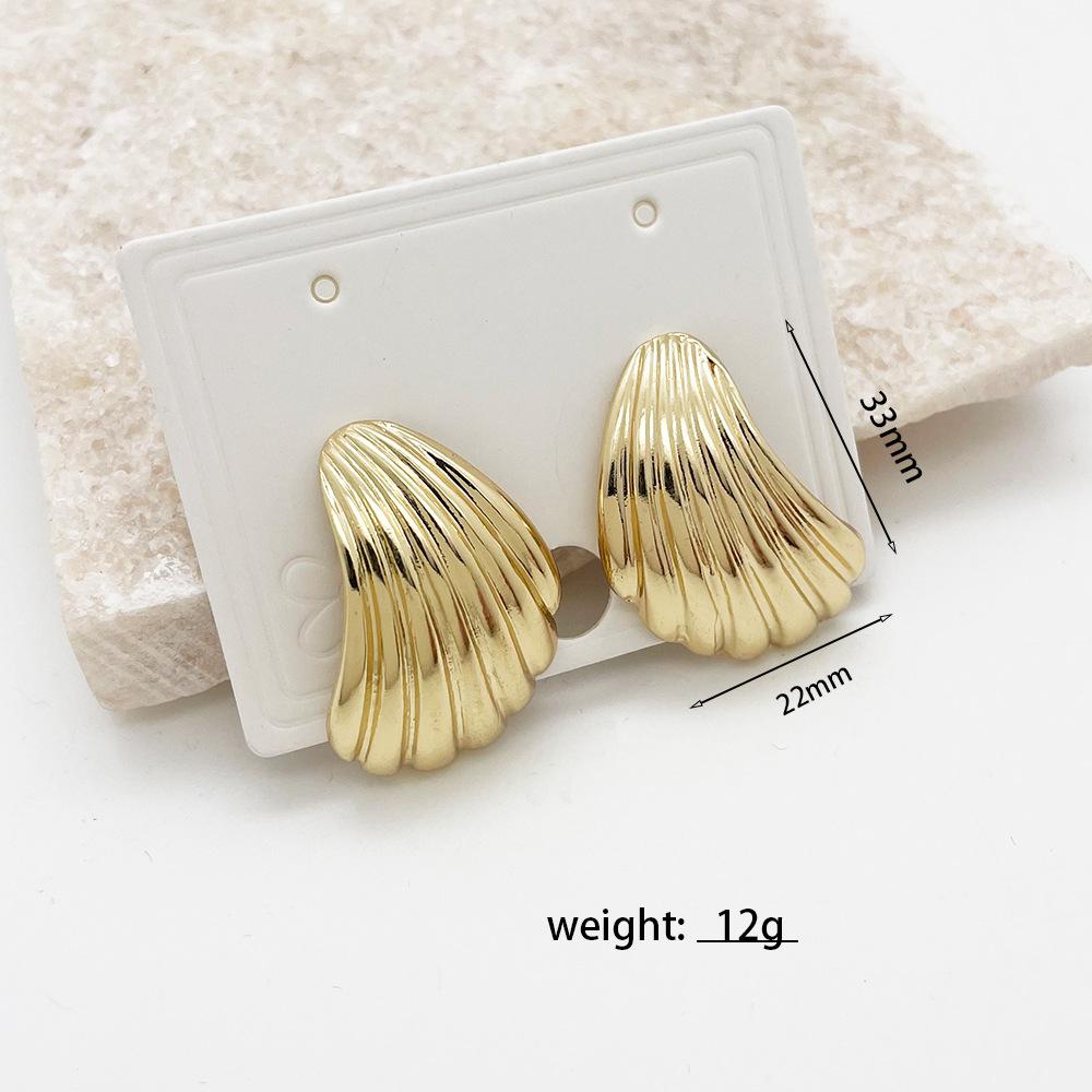 Elegant European  American Alloy Shell Stud Earrings - Trendy Street Style Gold Jewelry for Women