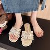 French pearl flat-bottomed one-word slippers for women's summer wear 2025 new super fire with skirt non-slip beach cool slippers