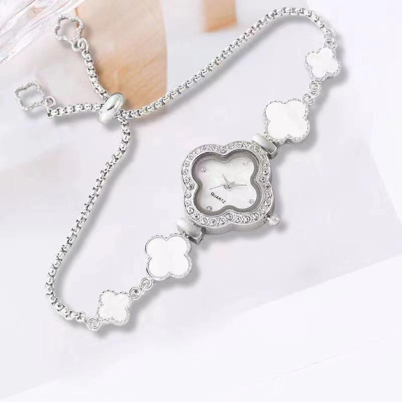 

Женские регулируемые часы-браслет «Четырехлистный клевер» с циферблатом, украшенным стразами One Size серебряный