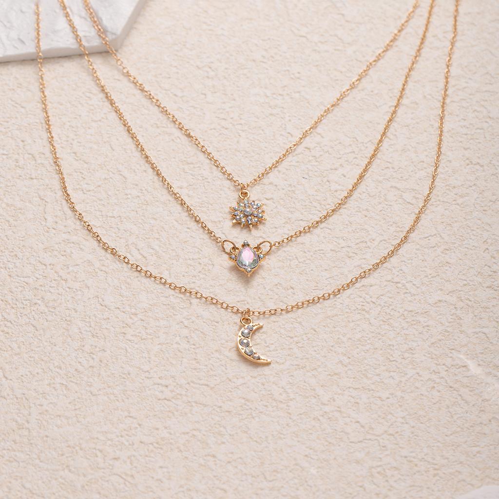Stacked star necklace, European and American jewelry, women's retro multi-layer light luxury design, diamond-encrusted water drop pendant