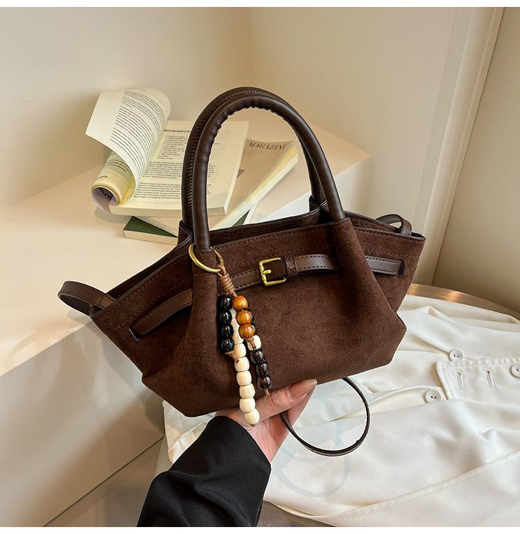 

Niche matte handbag women s new 2025 autumn and winter retro simple shoulder messenger bag fashionable leopard print wing bag