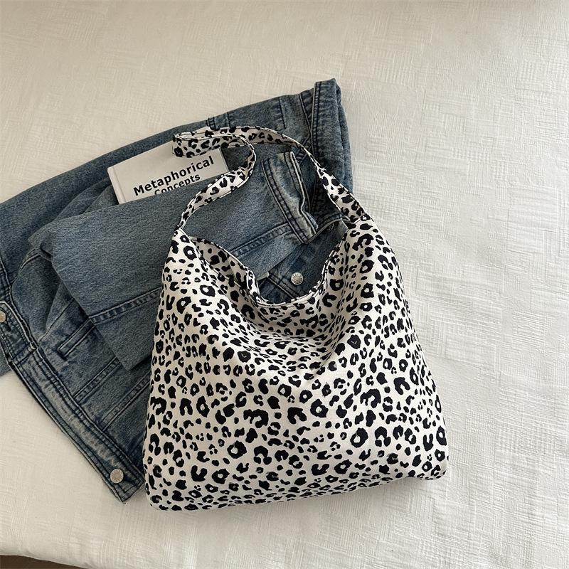 Design Sense Niche Canvas Bag Women's 2025 New Large-capacity Korean Leopard Print Floral Shoulder Student Printed Women's Bag