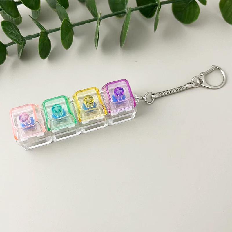 Transparent 4-Key Decompression Keychain with Light and Sound Effects