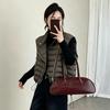 American retro large version  white duck down down vest women, winter fashion design sense oblique zipper ribs vest