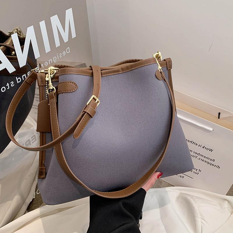 Vysoce kvalitní dámská crossbody taška Módní kontrastní barva Patchwork Velká kapacita Dámská plátěná taška ve tvaru kbelíku Klasická retro kabelka