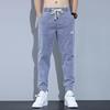 Pánská jarní a podzimní móda značky Loose Feet and Fat Pants Jeans