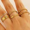 Gold-Plated Diamond-Inlaid Stainless Steel Cross Ring Set: Three-Piece Light Luxury Design with Single Row Stackable Flower Rings.