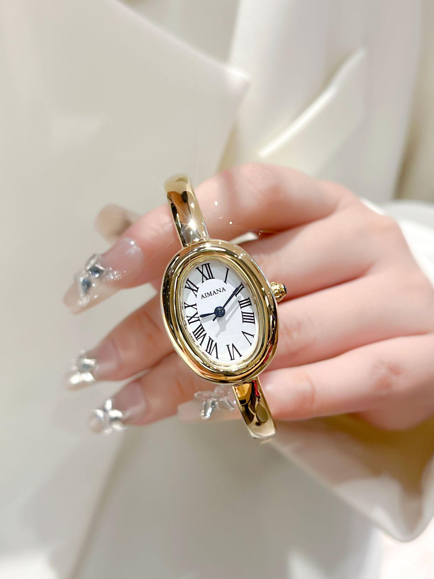 

AIMANA Женские овальные кварцевые часы-браслет: Маленький циферблат, римские цифры, стиль легкой роскоши.