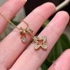 Exquisite Zirconia Flower Pendant Necklace with Round Ring and Sweater Chain - Light Luxury Petal Collarbone Accessory.