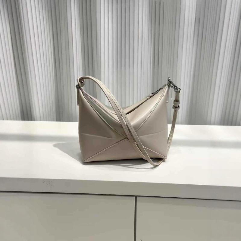 

Genuine leather creative foldable geometric handbag women s new cowhide designer niche underarm bag light luxury commuter bag 23*6.5*15.5cm білий