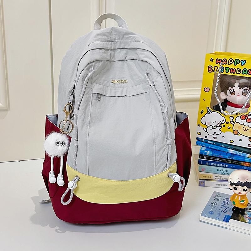 

Korean ins Light Travel Mountaineering Backpack Junior High School Student Water-proof Large Capacity Backpack Class School Bag Female single bag (without pendant) серый