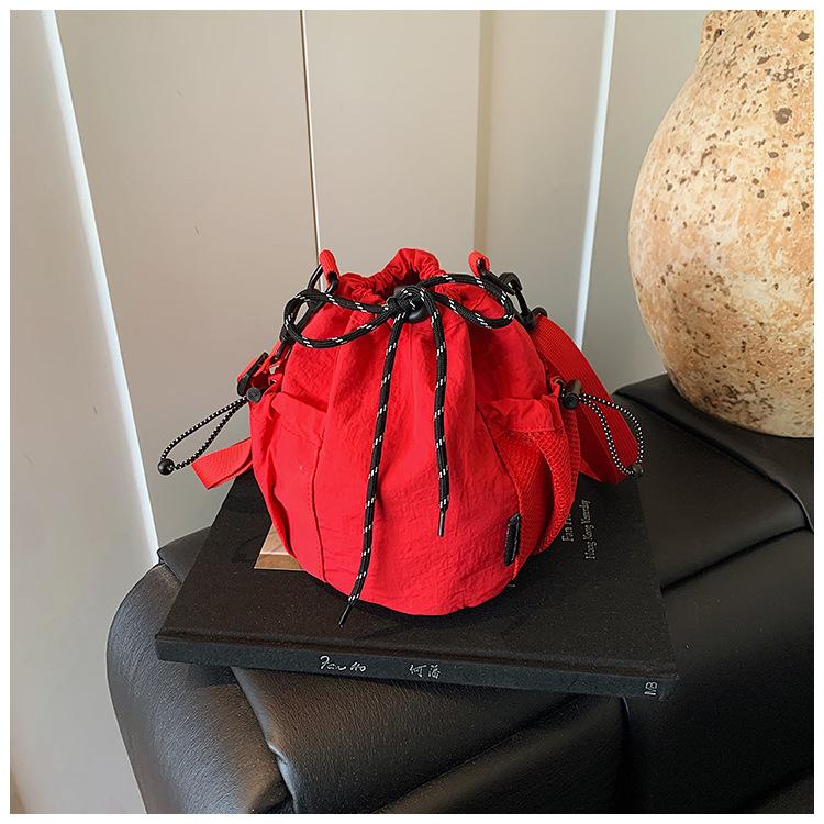 Canvas-Tasche Damen 2025 neue trendige Marke Handy-Tasche Freizeit Sport Reise Umhängetasche kleine Eimertasche