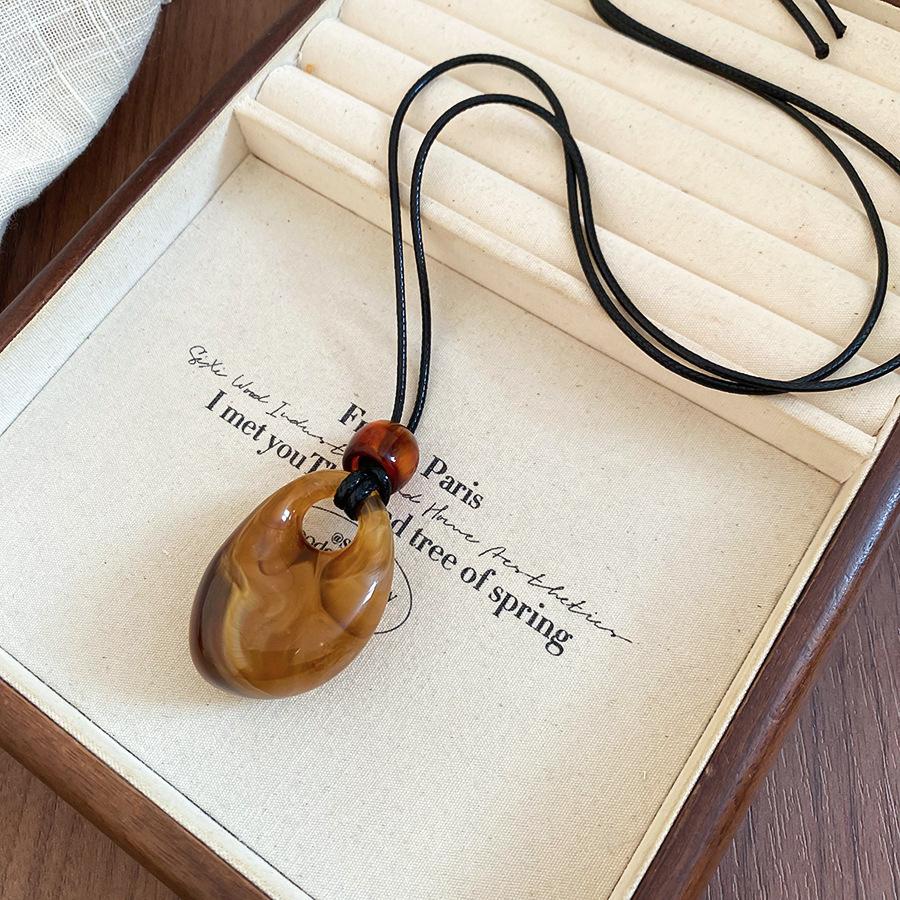 

Vintage wax rope water drop acrylic beaded pendant necklace Maillard style necklace niche design sweater chain women