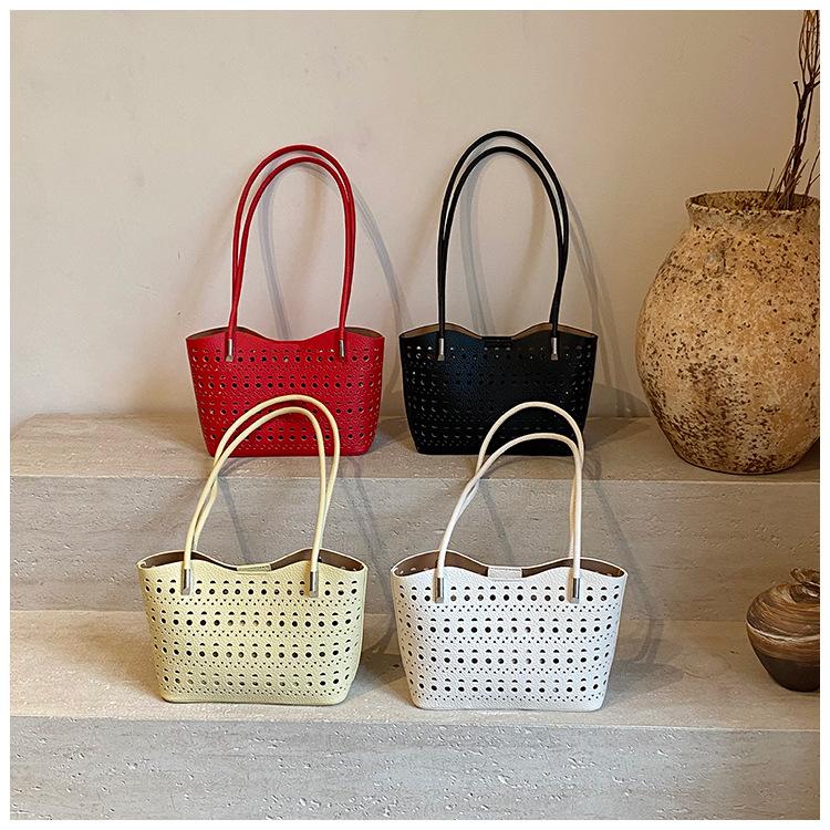 Large-capacity hollow bag women's summer 2025 new versatile shoulder mother and child bag leisure work commuter tote bag