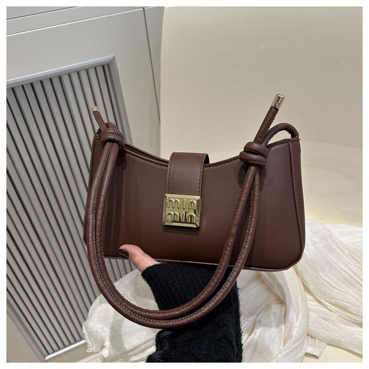 

2025 простой новый модный однотонный французский повседневный дизайн портативная сумка через плечо под мышкой женская сумка текстура популярный темперамент темно-коричневого