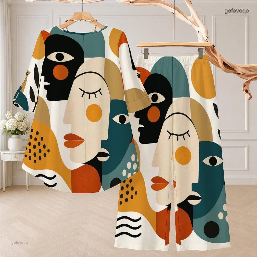 Women Plus Size Round Neck Three Quarter Sleeve Printed High Low Top And Wide Leg Pants Two Piece Set
