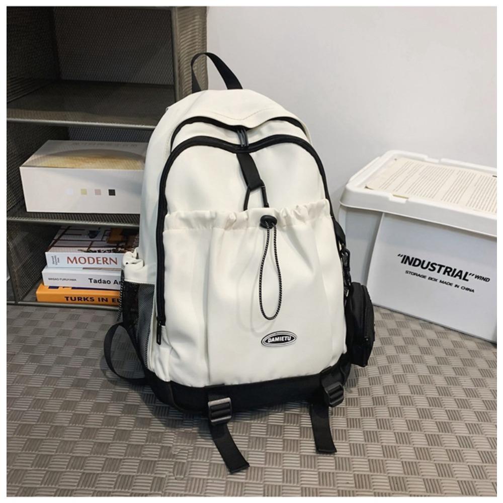 Casual backpack backpack new large-capacity Japanese and Korean boys college students solid color schoolbag