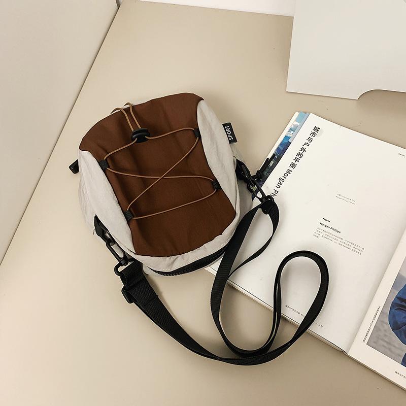 Crossbody bag women's contrasting color small bag ins trendy brand men's cross rope knot shell bag commuting versatile lightweight shoulder bag