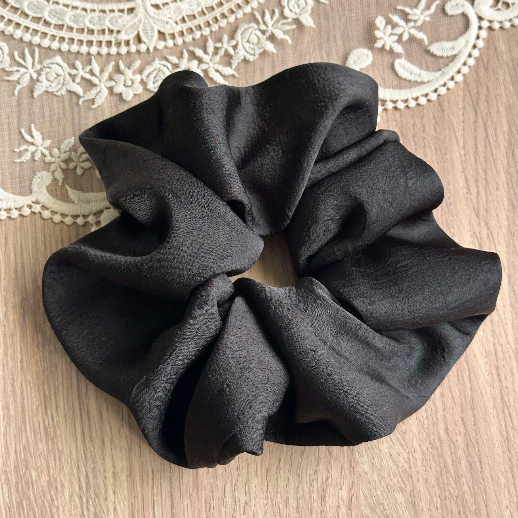 

Understated Elegant Scrunchies In Rich Earthy Tones With A Subtle Sheen For A Minimalist And Polished Professional Look Textured Black