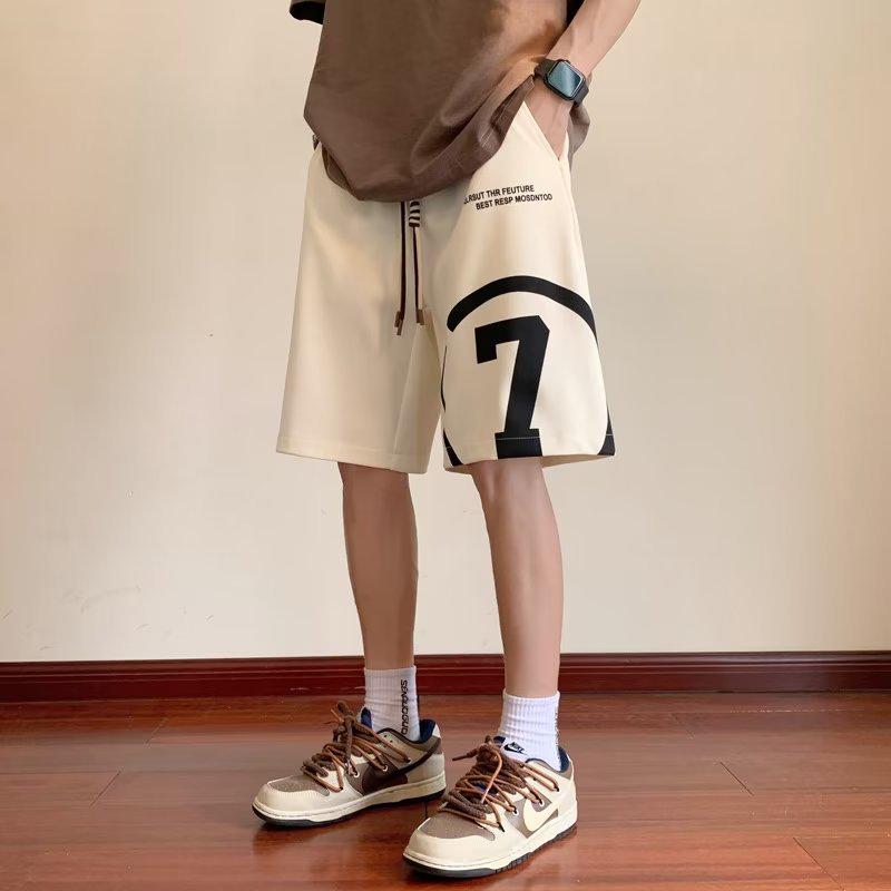 "Trendige Jungen-Basketballshorts - Locker, Mittellang, Lässiger Sportstil."