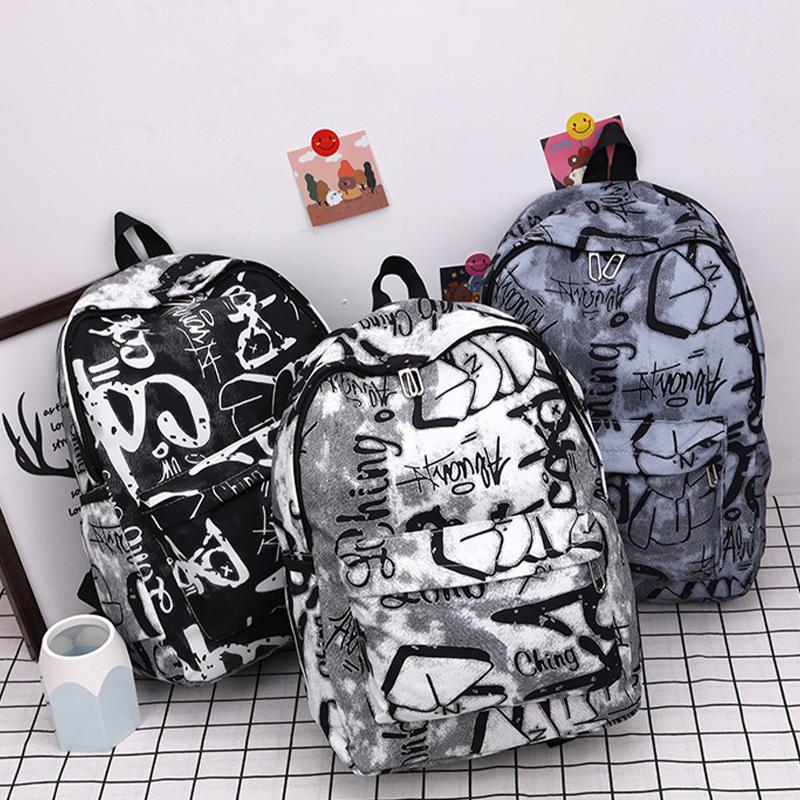 Nouveau Sac à Dos Scolaire Couple Lettres Graffiti Mode Loisirs Voyage Multifonctionnel