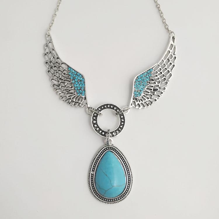 Schickes europäisch-amerikanisches Türkis-Flügel- & Wassertropfen-Halsketten-Ohrring-Set