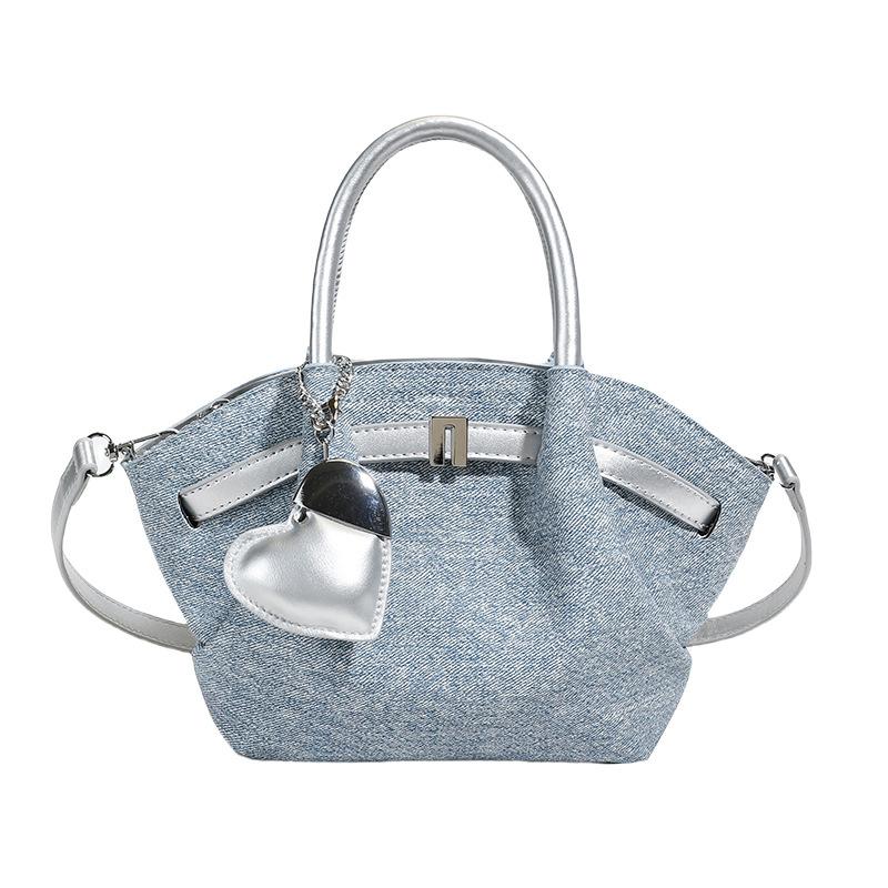 Korean senior sense of bucket shape soft and durable fashion exquisite new light luxury commuting slanting cross shoulder handbag