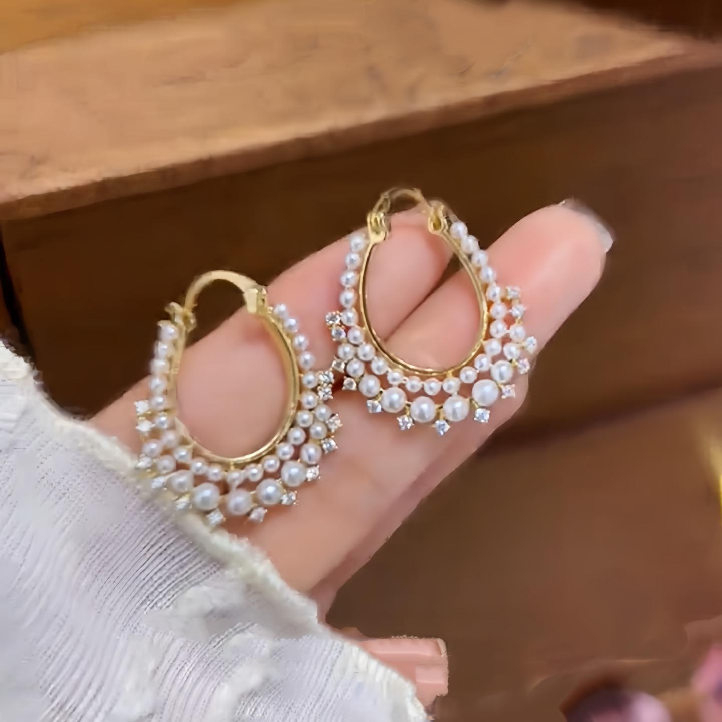 

Diamond-Encrusted Pearl Twisted Ear Cuffs: Luxurious, Fashionable, and Unique Design.