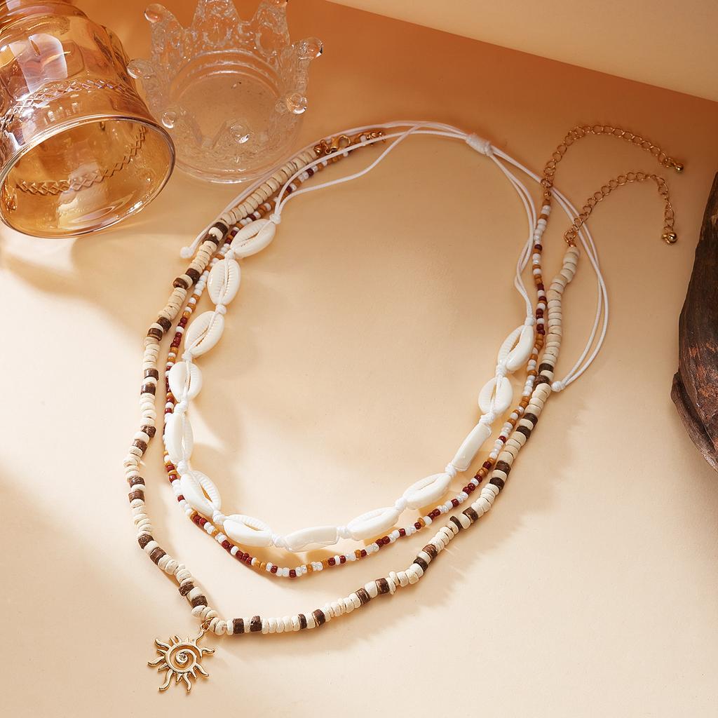 Unisex Boho Surfer Layered Necklace for Women Man Cowrie Shell Choker Tribal Wood Bead Sun Pendant Summer Beach Vacation Jewelry