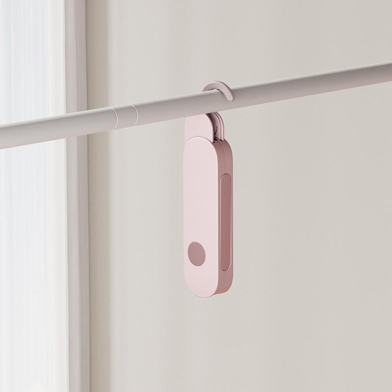 

Foldable Clothes Hanger Outdoor Travel Portable Folding Clothes Hanger Business Trip Hotel Seven Hole Clothes Hanger Divine Tool розовый