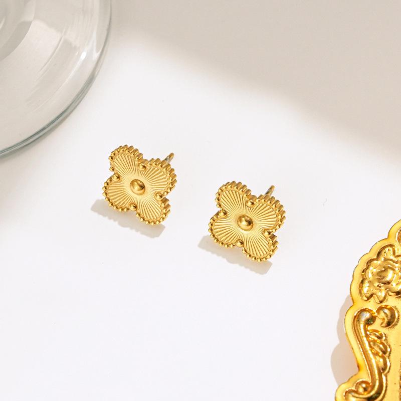 Elegant Four-Leaf Clover Necklace & Bracelet Set - Titanium Steel, Laser-Cut Design, Stylish for European & American Fashion.