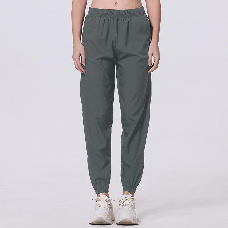 Vår og Sommer Tynne Dame Hurtigtørkende Sports Fritidsbukser Mesh Pustende Svart Alt-match Sports Ni-punkts Bukser Løpe Haremsbukser