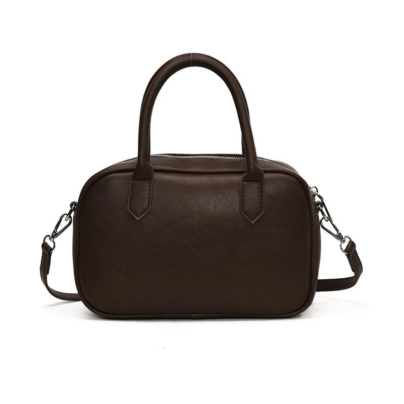 Popular fashion simple texture solid color portable Boston bag women's retro niche casual shoulder messenger bag