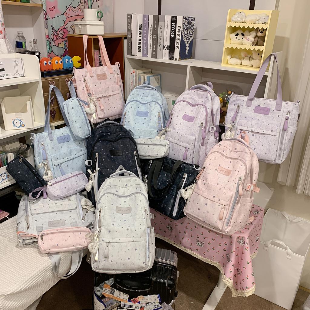 Schoolbag new ins wind three-piece schoolbag high value junior high school students large capacity load reduction nylon backpack